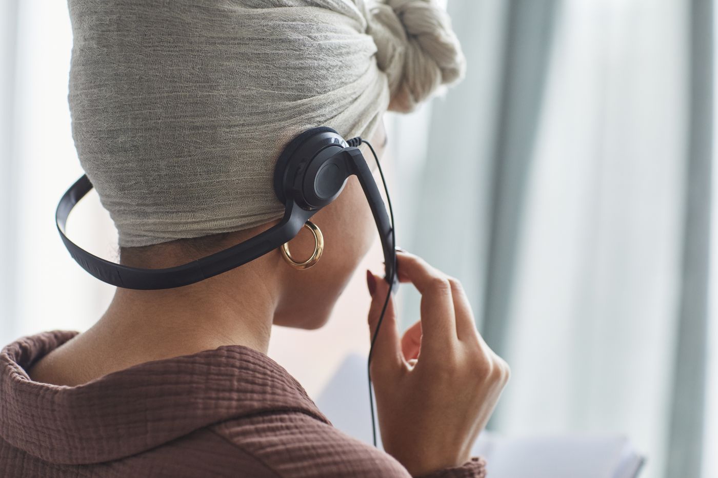 Customer service representative wearing a headset during a call